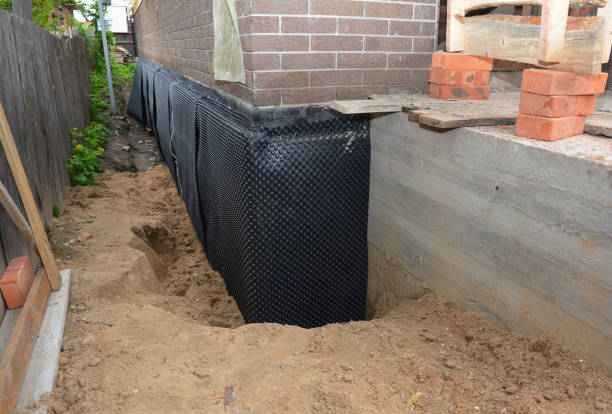 SJ Waterproofing Pros technician performing targeted Waterproofing assessment in Broad Run, VA